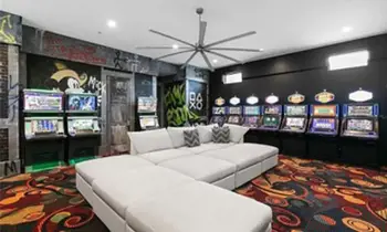 Buy-in for this poolside casino home in Kissimmee, FL
