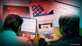 Cops arrest two men allegedly linked to online gambling syndicate