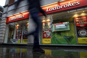 Entain's online gambling growth slows but betting shops rebound