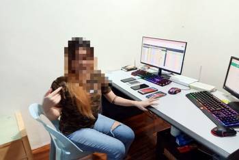 Kuching cops bust online gambling call centre, two arrested
