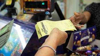 Lotto: Powerball jackpots to $14 million after no winner, four split First Division