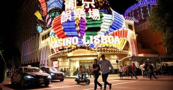 Macau shuts most businesses amid COVID outbreak, casinos stay open