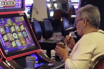 Opponents of smoking in casinos try to enlist shareholders of gambling companies in non-smoking push