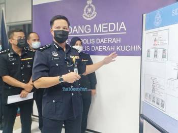 Raid on illegal online gambling operation in Kuching nets 13 foreigners