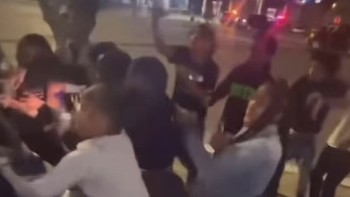 Shocking moment dozens of Las Vegas teens brawl outside casino during 'Santa Fe Station Shutdown' event