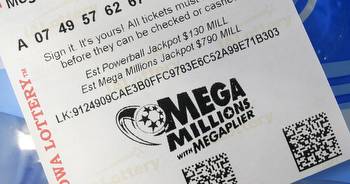 Winners of $1.34 billion Mega Millions jackpot turn in ticket
