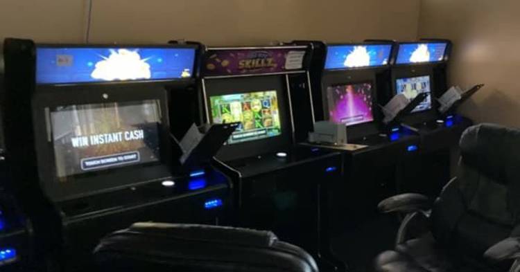 11 slot machines, 56 gambling computers confiscated from 2 businesses in Flint, officials say