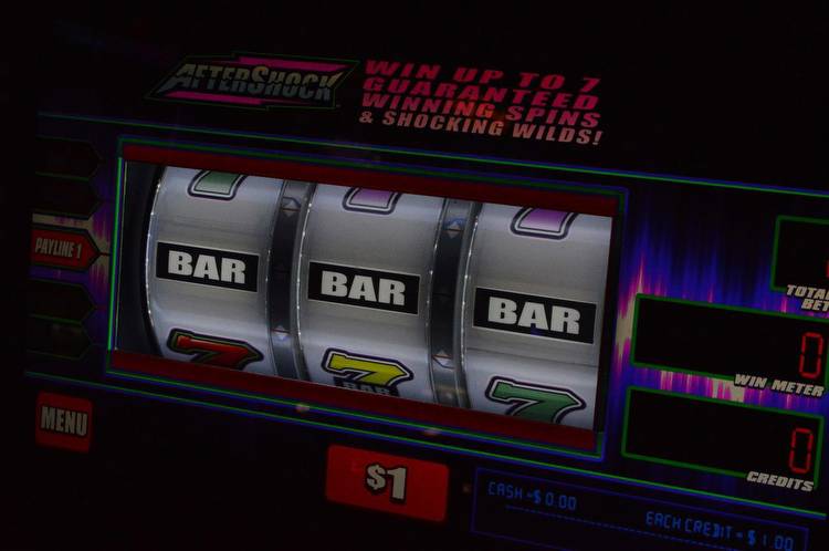 Illinois investigators seize slot machines and cash in illegal gambling raid