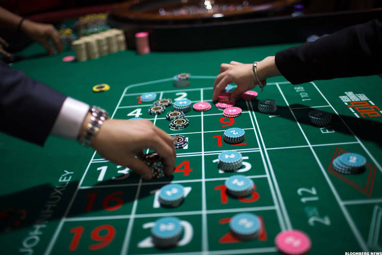 Macau's Casino Stocks, Near Record Lows, Face Specter of Tough License Reviews
