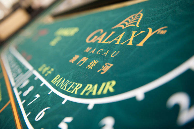 Uncertainty abounds over Macau gaming law provision for GGR-based cap on table games, slot machines